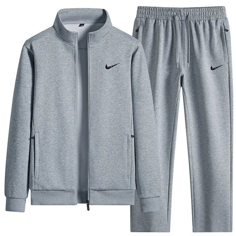 Black tracksuit set with a zip-up jacket and pants