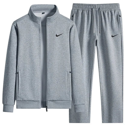 Black tracksuit set with a zip-up jacket and pants